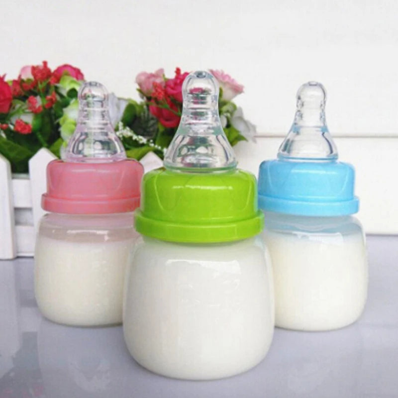 60ML Baby Newborn Mini Portable Feeding Nursing Bottle BPA Free Safe Infant Nursing Nipple Care Feeder Fruit Juice Milk Bottles
